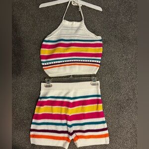 Women’s medium size halter crop top with matching striped cotton shorts.